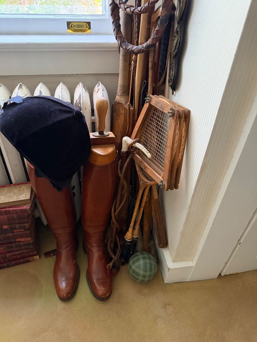 Riding boots, racquets, and vintage sporting pieces at the Caldwell estate sale